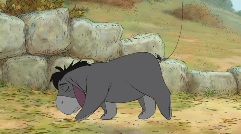 The Endearing Charm of Winnie the Pooh and Friends 17 The character in the picture is Eeyore, the old, gray stuffed donkey from A. A. Milne's Winnie-the-Pooh books.Created by A.A. Milne, Image: © Disney/Everett