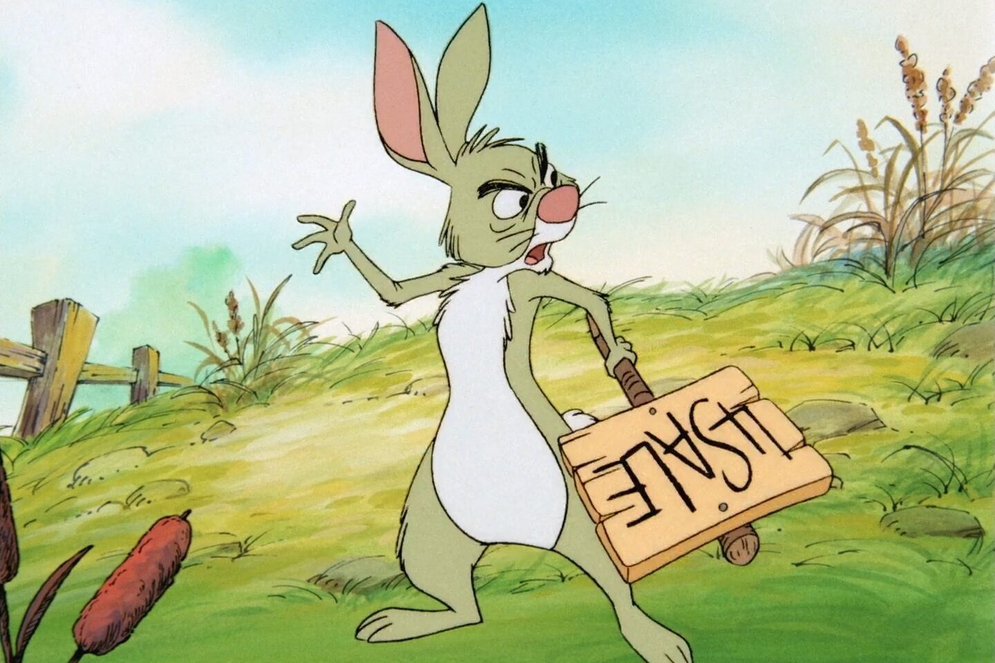 The Endearing Charm of Winnie the Pooh and Friends 18 The picture shows the character Rabbit from the Winnie the Pooh universe holding a sign that says "SALE" upside down. Created by A.A. Milne, Image: © Disney/Everett